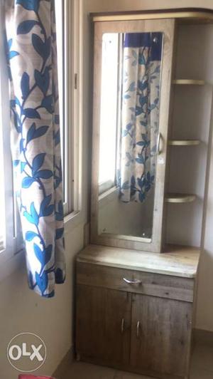Dressing table with mirror and shelves