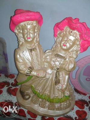 Man And Woman Wearing Pink Hat Ceramic Decor