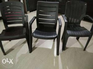 Three Plastic Chairs