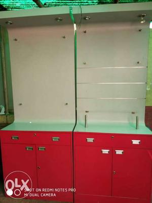 Two Red And White Wooden Cabinets