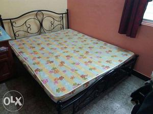 Wrought iron bed with mattress.size 5.5×6