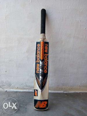 Black And Brown New Balance Cricket Bat