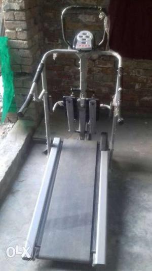 Black And Gray Treadmill With Stepper And Twister
