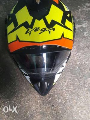 Black, Orange, And Yellow Vega Motocross Helmet