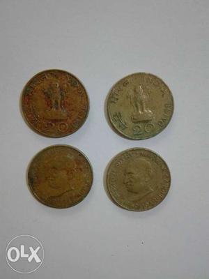 Four Copper-colored 20 Indian Paise Coins