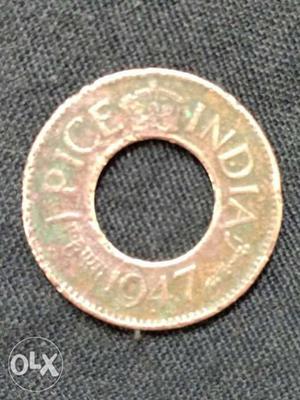 Silver-colored 1 Indian Pice Coin