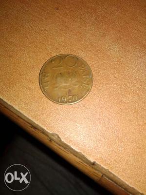 This is a coin of 20 paise made by RBI in 