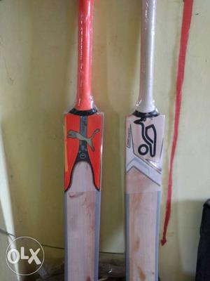 Two Brown PUMA And Kookaburra Wooden Cricket Bats