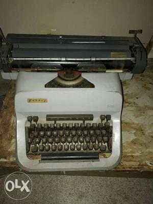 White And Grey Typewriter