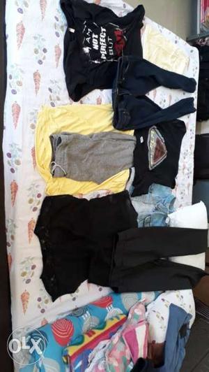 100 each.. Best deal. And the clothes looks new