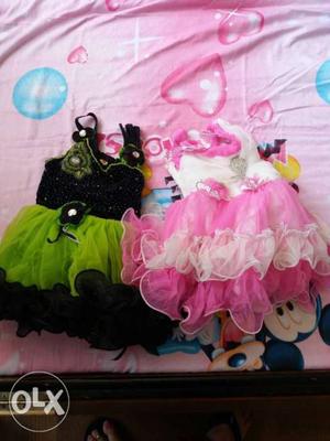 2 frocks for 6 monts to 1 year old girl..almost