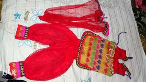 Beautiful Punjabi suit in red colour for baby