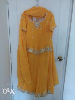 Georgette lehenga in mango yellow colour with