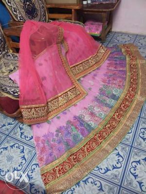 Net pink designer lehenga with heavy dupatta and