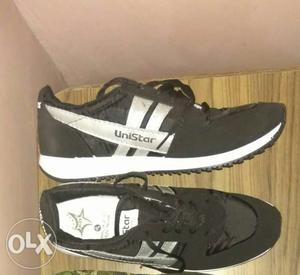 Pair Of Black-and-white Sneakers. Size 7-8