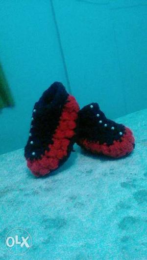 Pair Of Red-and-black Knitted Shoes