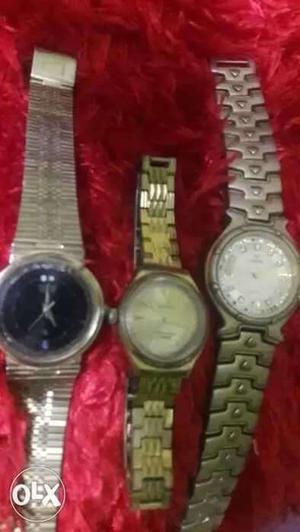 Three Round Silver Chronograph Watches