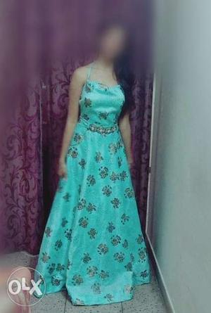 Turquoise blue Cinderella gown floor touch