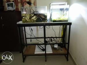 2 Aquariums with stand and accessories such as