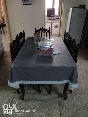 6 seater solid wood Dining table with chairs.