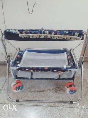 Baby's Blue And White Swing Travel Cot