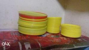 Two Yellow And Red Ceramic Bowls