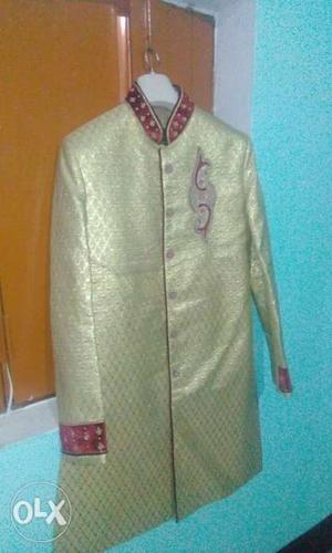 A Set of Sherwani with chunari, pagdi and shoes