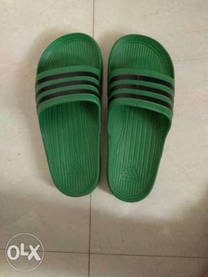 Adidas green slide. size 8 urgent sale.