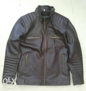 Artificial leather jacket. Brown color.