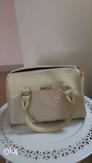 BRAND NEW!!! Small white handbag with pink satin liner