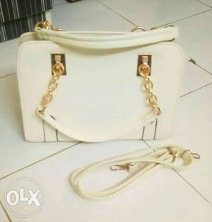 Beautiful brand new offwhite hand bag at just rs