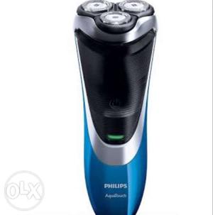 Blue And Black Philips Electric Shaver