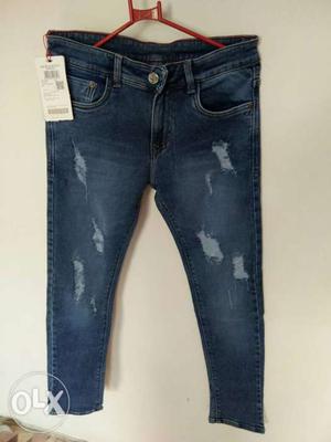 Blue-washed Distressed Jeans
