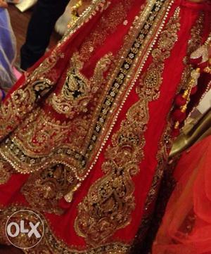Designer wedding lehanga by Odhni-Amyra in red