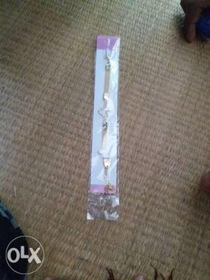 Gold-colored Bracelet With Plastic Pack