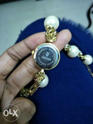 Ladies stone and pearl watch