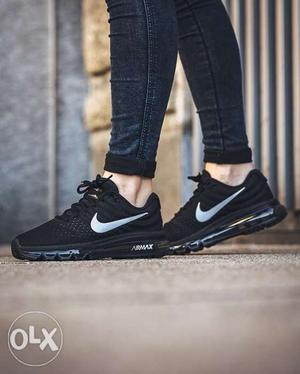 Pair Of Black Nike Shoes