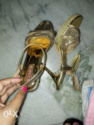 Pair Of Gold Leather Heeled Sandals