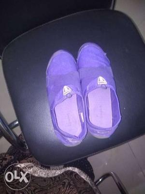 Pair Of Purple Slip-on Shoes
