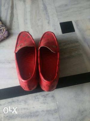 Pair Of Red Flat Shoes