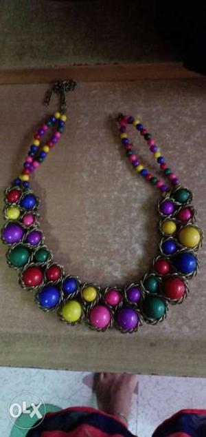 Purple, Green, And Red Beaded Necklace