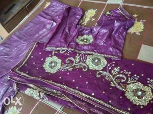 Purple net party wear sari