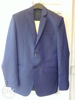Raymond Navy Blue 3 piece suit with yellow shirt.