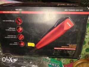 Red And Black Remington Hair Straightener Box