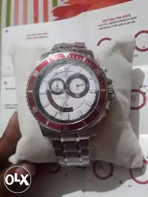 Round White And Red Chronograph Watch With Silver Link