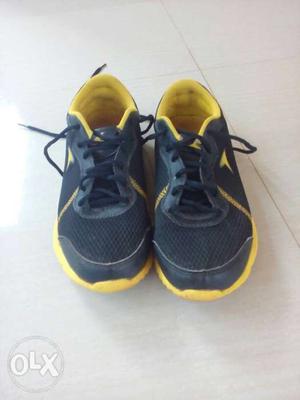 Sports shoe,2 month old,yellow with black,size 7