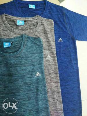 T-shirt Three Blue, Gray, And Teal Adidas Crew-neck Shirts