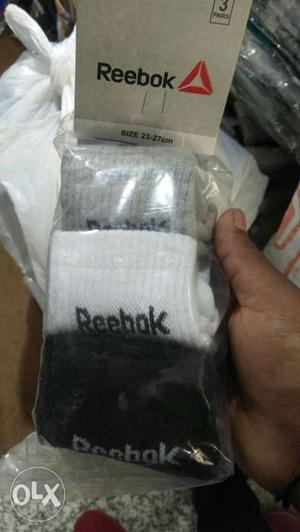 Three Grey, White, And Black Reebok Sock Pack