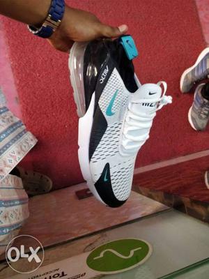 White And Black Nike Athletic Shoe