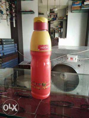 Yellow And Red Plastic Bottle